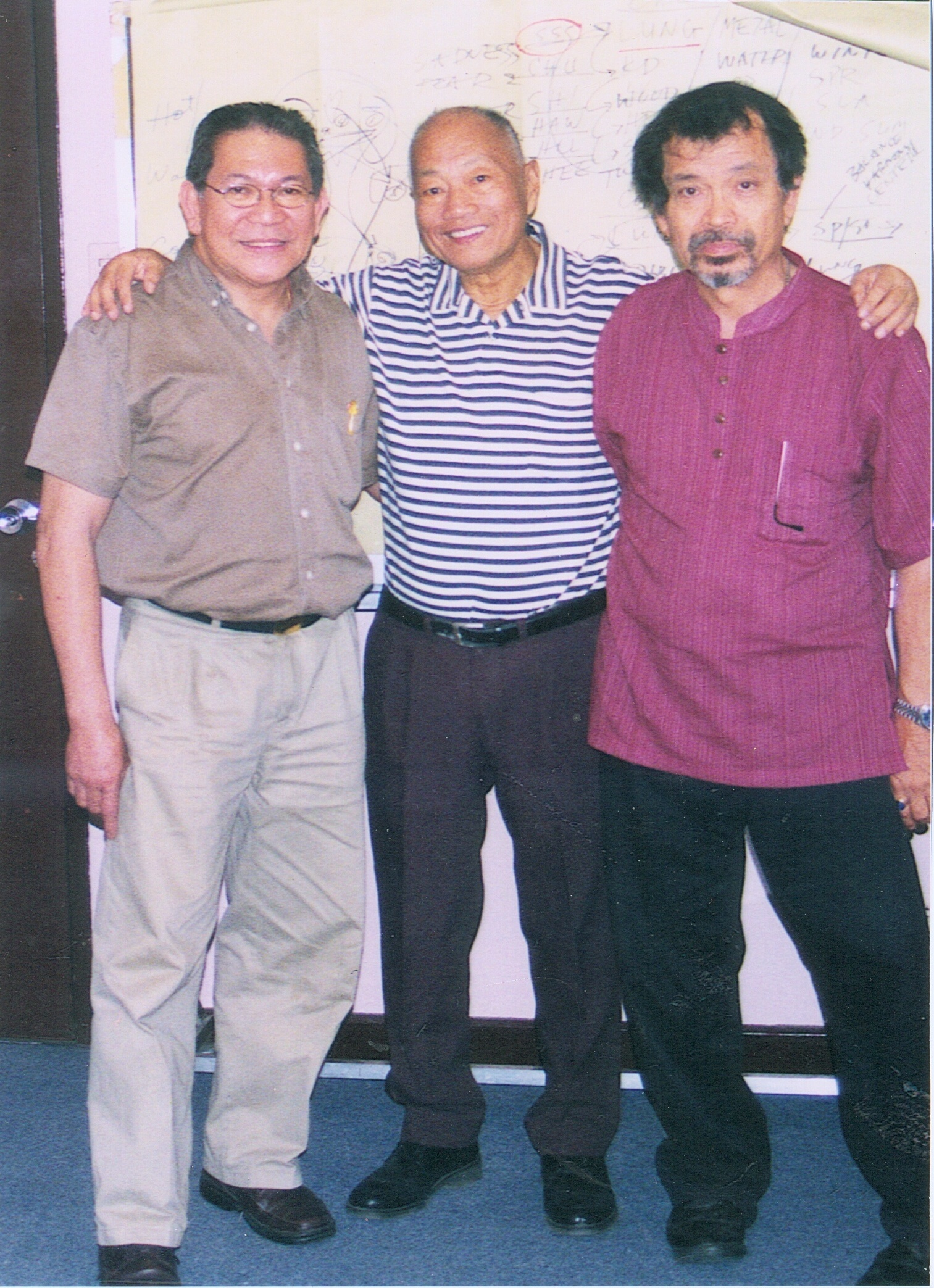 GM Johnny F. Chiuten with Dr. Jopet Laraya, martial arts master in HK, and Rene J. Navarro, 5 years ago, in the University of the Philippines. 