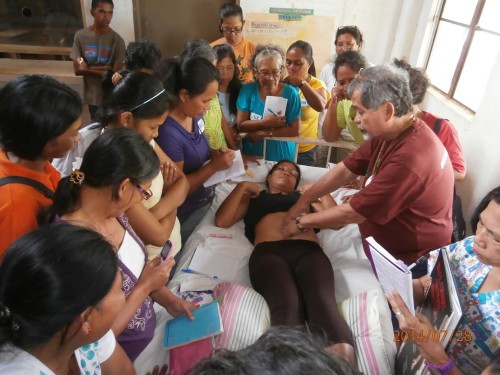 At the seminar in Homonhon island, one of the places devastated by the typhoon Haiyan/Yolanda, held in late July 2014. There were 30 women from different villages who attended the 2 and 1/2 days seminar that included 6 Healing Sounds, Uling/Charcoal Terapi, Jade Mountain CNT internal organs massage, and Qigong.