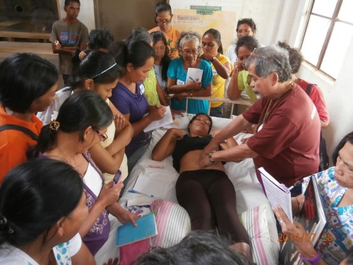 At the seminar in Homonhon island, one of the places devastated by the typhoon Haiyan/Yolanda, held in late July 2014. There were 30 women from different villages who attended the 2 and 1/2 days seminar that included 6 Healing Sounds, Uling/Charcoal Terapi, Jade Mountain CNT internal organs massage, and Qigong. 