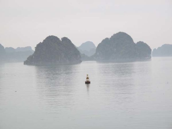Vietnam Ha Long Bay 2 islands and a buoy