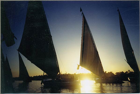 Boating on the Nile in Upper Egypt at sunset.