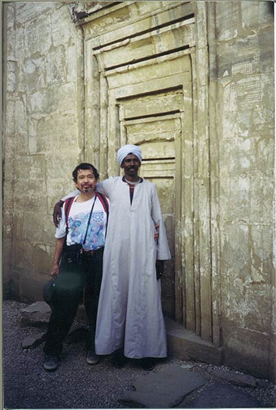 With one of the temple guides. This was at one of the smaller temples. We are standing in front of the 7 doors. They do not open to anything. Did they represent the 7 chakras?