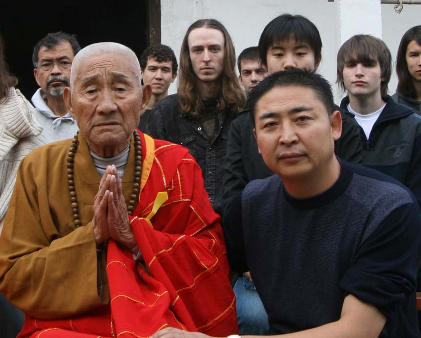 Buddhist hermit Xuan Kong and and to his left healer extraordinary Jiang Feng. Photo taken in the foothills of Huangshan/Yellow Mountain in Anhui Province in October 2017. Xuan and Jiang were David Verdesi's masters. They have passed on the last 5/6 years. 