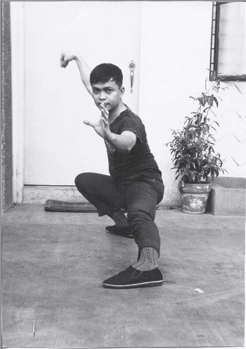 A posture called "Snake Creeps Down" from the Yang Family Tai chi chuan form. I studied Tai chi chuan at the Hua Eng Athletic Club in Manila's Chinatown in 1968. Photo was taken in 1970.