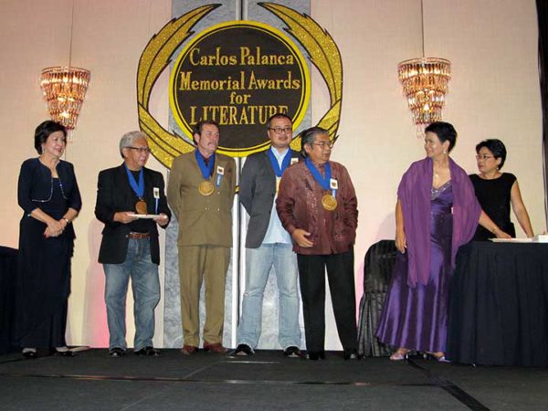 Ed being introduced on stage along with the winners and the other judges. Ed has won most of the literary awards in the country.