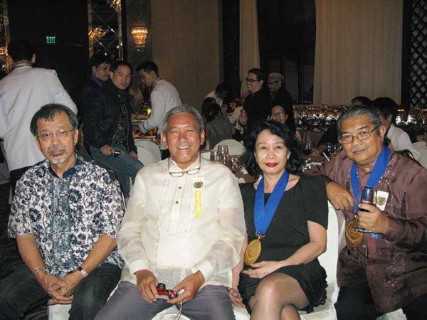 Ed, Krip Yuson (also an award-winning writer and poet, and me and an unidentified woman.