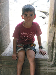Angkor Wat Boy in ruins